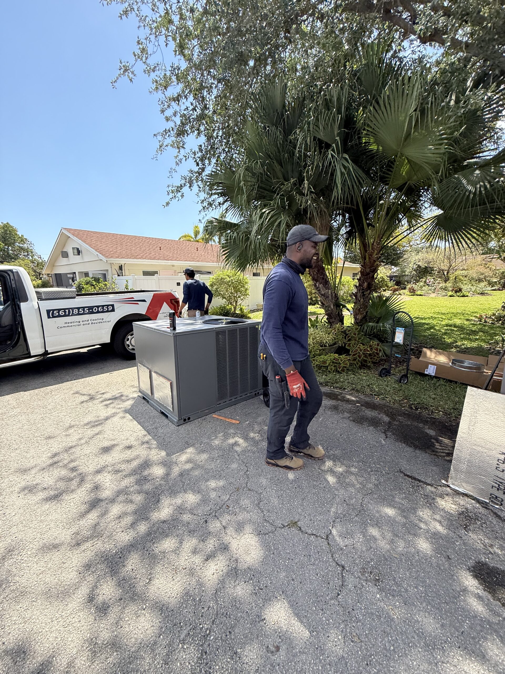 Prime Air HVAC technicians on the job — licensed AC repair and installation team Boca Raton FL