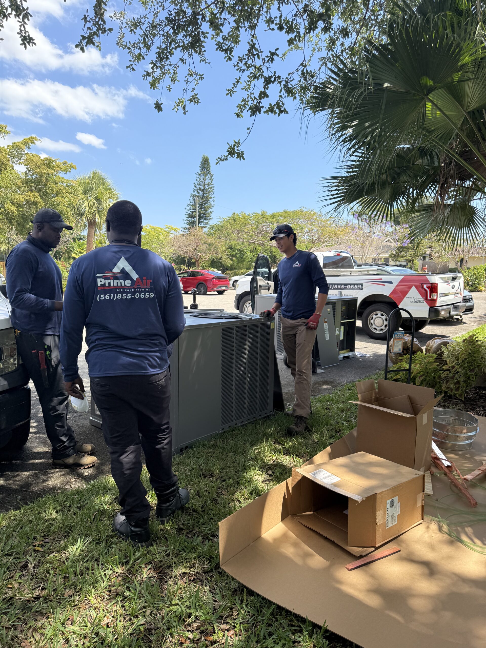 Prime Air HVAC technicians on the job — licensed AC repair and installation team Boca Raton FL